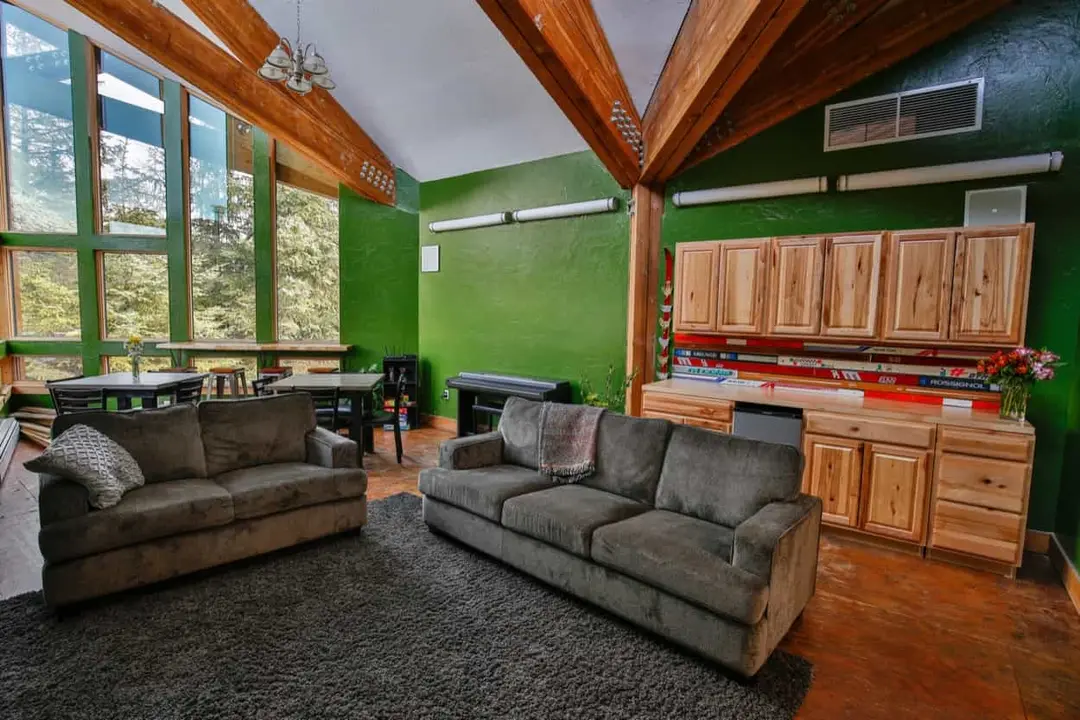 Sanctuary set with rows of chairs facing the windows